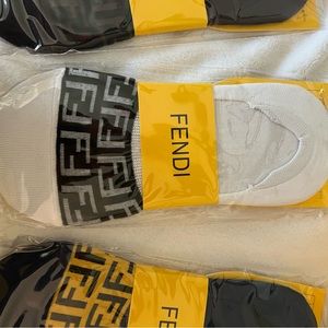 Package of 4 no show Gucci socks.